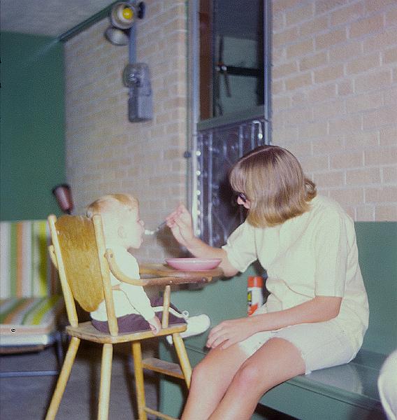 0280-Judy feeding John Horton.jpg - John and Judy.  Forest Street, Denver.